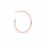 A Crescent Hoop / Medium in rose gold on a white background.