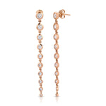 Rose gold Diamond Cascade Earrings on a white background. 