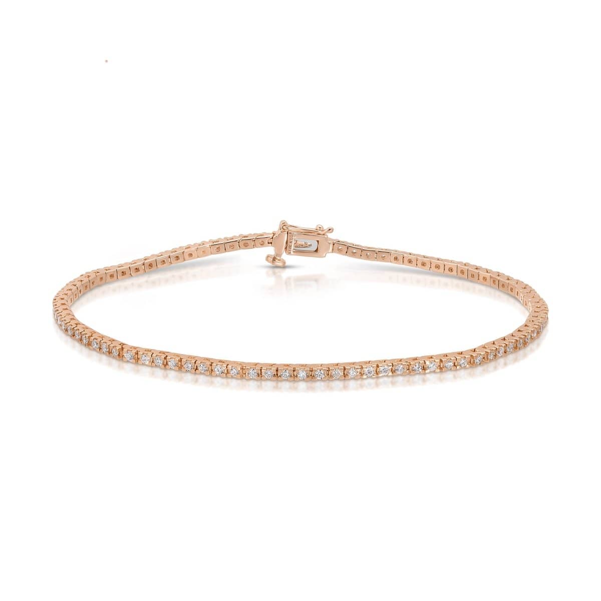 A Down the Line Bracelet in rose gold on a white background. 