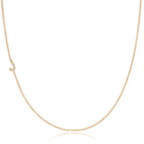 A rose gold necklace with a pave letter J charm on a white background.