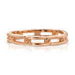 A rose gold Link Ring on a white background. 