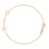 A Mama Bracelet in rose gold with a beaded chain on a white background. 