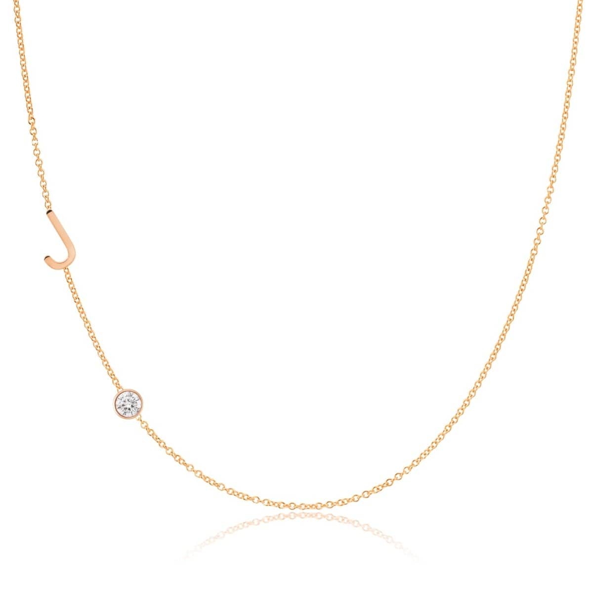 A Monogram Necklace with Diamond Rose Gold with the letter J on a white background.