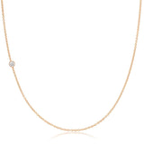 A rose gold 14K Gold Asymmetrical Birthstone Necklace - Diamond (April) on a white background. 