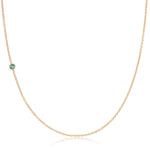 A rose gold 14K Gold Asymmetrical Birthstone Necklace - Emerald (May) on a white background.