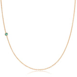 A rose gold 14K Gold Asymmetrical Birthstone Necklace - Emerald (May) on a white background.
