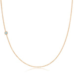 A rose gold 14K Gold Asymmetrical Birthstone Necklace - Aquamarine (March) on a white background. 
