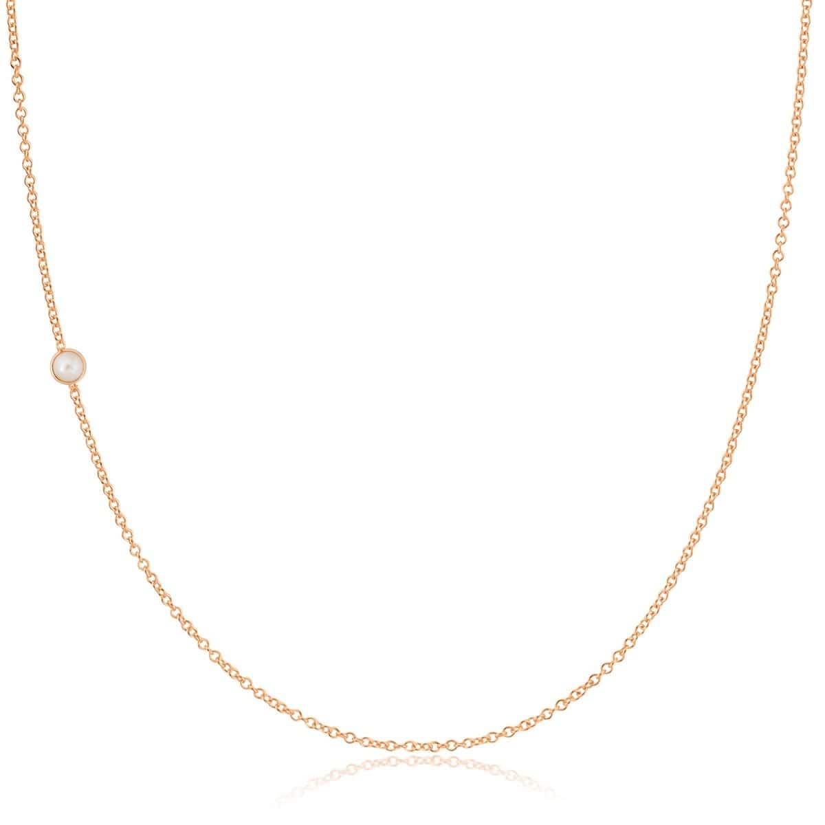 A rose gold 14K Gold Asymmetrical Birthstone Necklace - Pearl (June) on a white background. 