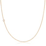 A rose gold 14K Gold Asymmetrical Birthstone Necklace - Pearl (June) on a white background. 