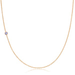 A rose gold 14K Gold Asymmetrical Birthstone Necklace - Tanzanite (December) on a white background. 