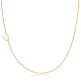 A rose gold necklace with a U letter charm on a white background. 