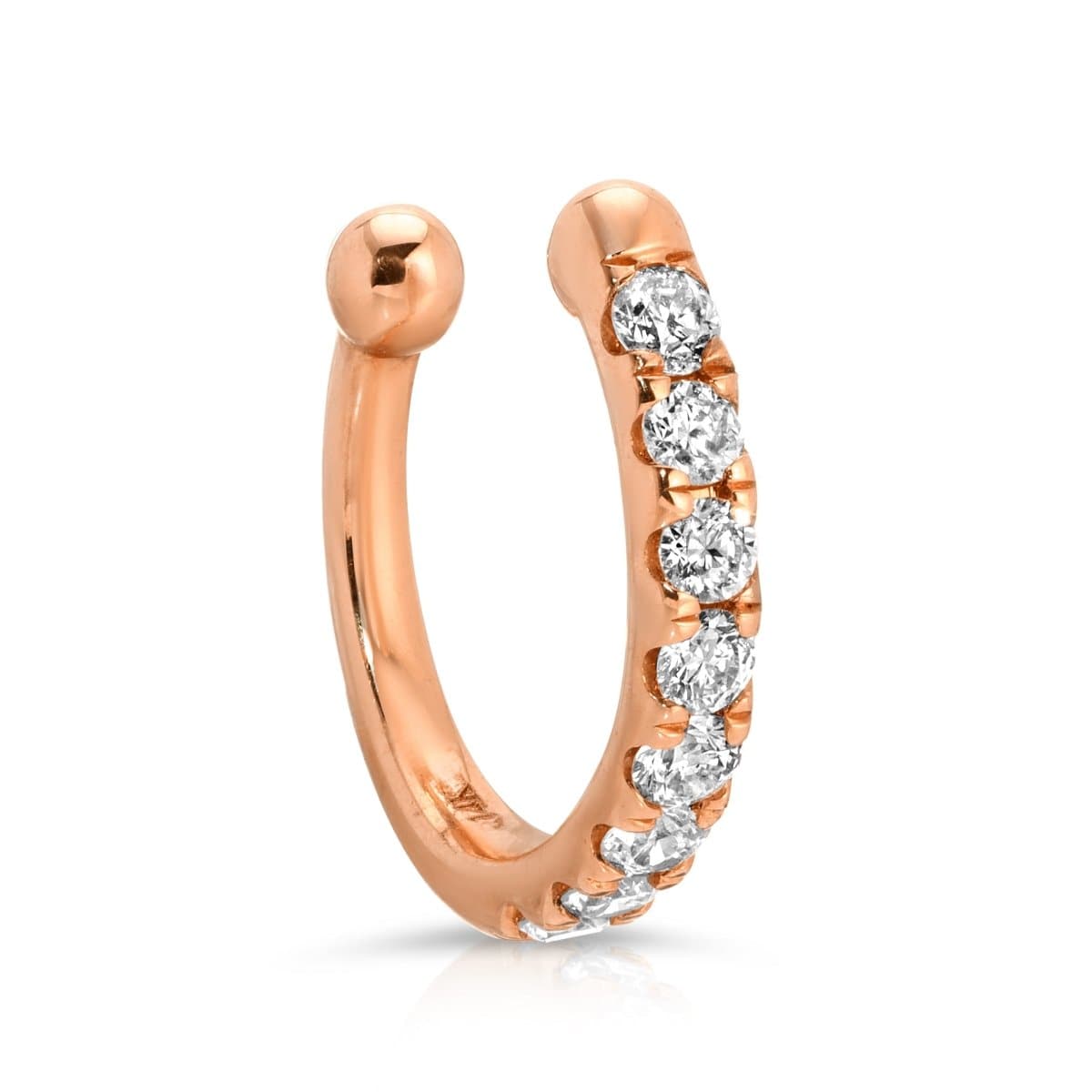 A Pavé Ear Cuff in rose gold on a white background. 