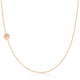 A rose gold 14k Gold Asymmetrical Charm Necklace - Paw with a bead chain on a white background. 