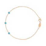 A rose gold Custom Gold Bracelet - 3 Letters with turquoise birthstones on a white background. 