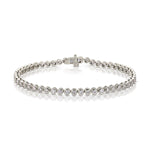 A Love Set Match Bracelet in white gold on a white background. 