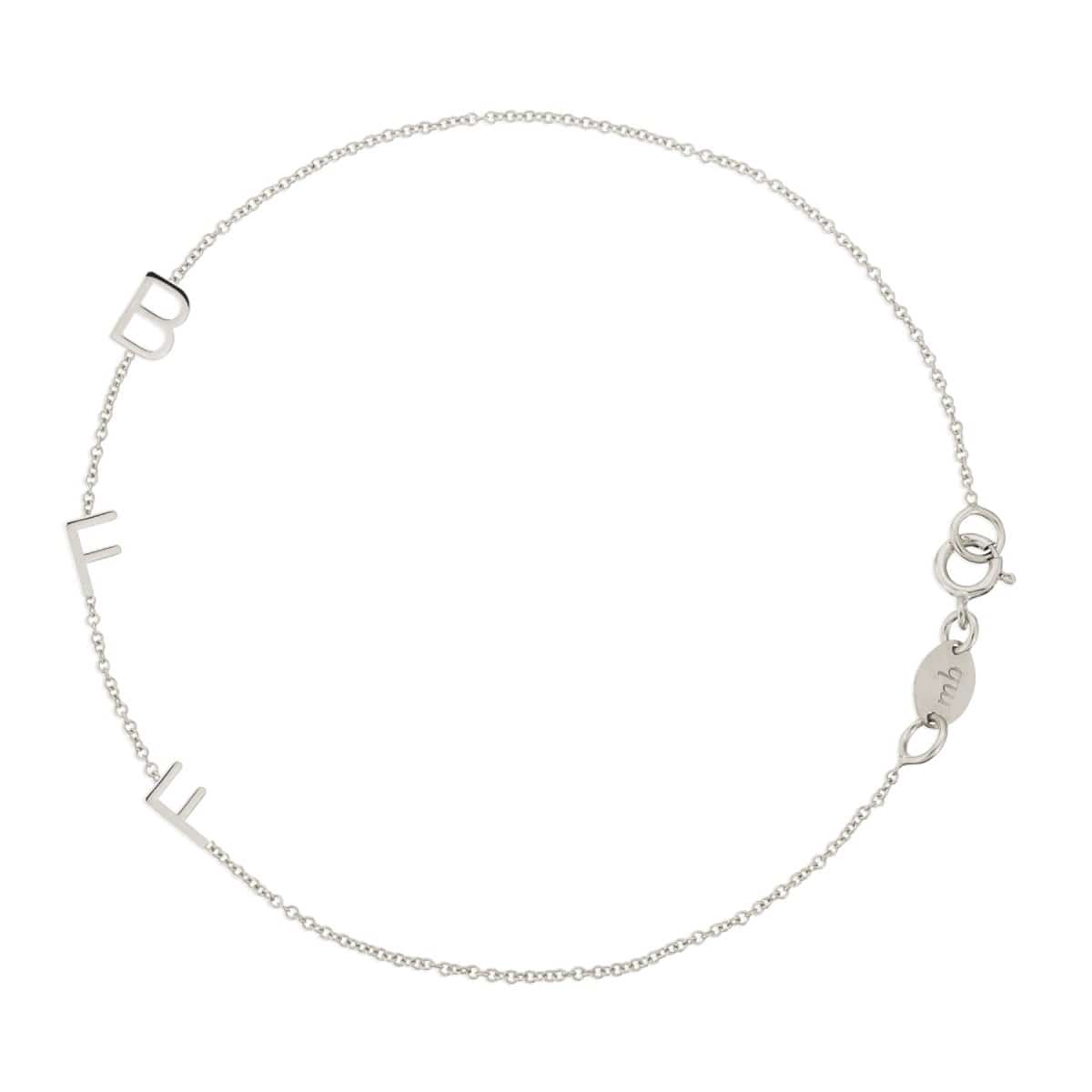 A white gold BFF Bracelet in a cable chain bracelet on a white background. 