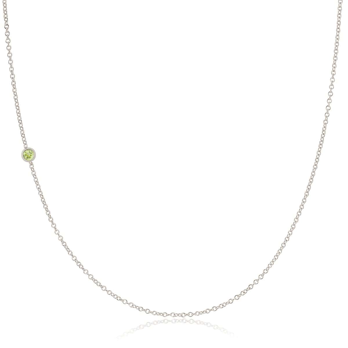 A white gold 14K Gold Asymmetrical Birthstone Necklace - Peridot (August) on a white background. 