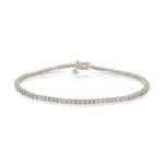 A Down the Line Bracelet in white gold on a white background. 