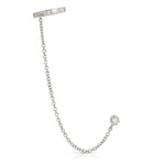 A Coupling Ear Cuff + Stud in white gold on a white background. 