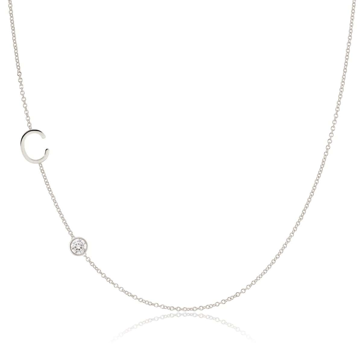 A Monogram Necklace with Diamond White Gold with the letter C on a white background.