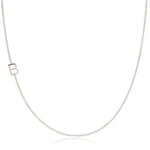 A white gold necklace with a B letter charm on a white background. 