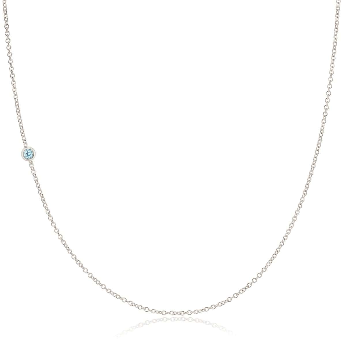 A 14K Gold Asymmetrical Birthstone Necklace - Aquamarine (March) in white gold on a white background. 