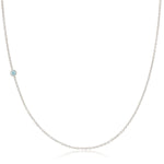 A 14K Gold Asymmetrical Birthstone Necklace - Aquamarine (March) in white gold on a white background. 