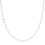 A white gold necklace with a C letter charm on a white background. 
