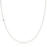 A white gold necklace with a T letter charm on a white background. 