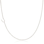 A white gold necklace with a U letter charm on a white background. 