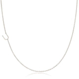 A white gold necklace with a U letter charm on a white background. 