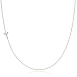 A white gold necklace with a letter Y pave charm on a white background.