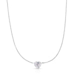The Sweetheart Necklace - White Sapphire in white gold on a white background. 