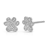 A pair of Pavé Charm Studs - Paw in white gold on a white background.
