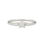 A Twinkle Twinkle Ring in white gold on a white background.