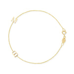 A yellow gold Custom Gold Bracelet - 2 Letters (with the letters M and B) on a white background. 
