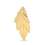 A 20th Anniversary Leaf Pendant in yellow gold on a white background. 