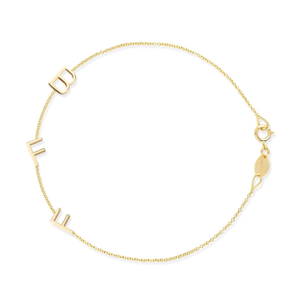 A yellow gold Custom Gold Bracelet - 3 Letters (B, F and F) on a white background. 
