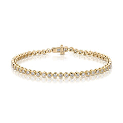 A Love Set Match Bracelet in yellow gold on a white background. 