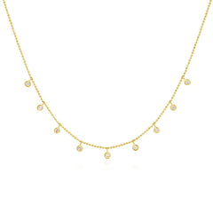 A yellow gold Stardust Diamond Necklace on a white background. 