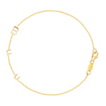 A yellow gold BFF Bracelet in a beaded chain bracelet on a white background. 