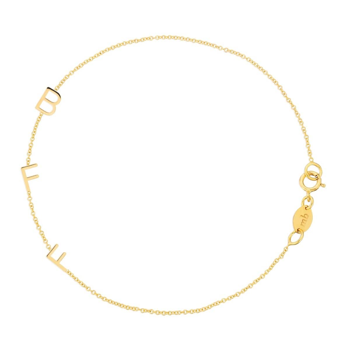 A yellow gold BFF Bracelet in a cable chain bracelet on a white background. 