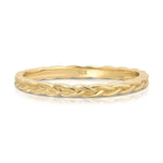 A Braided Ring in yellow gold on a white background.