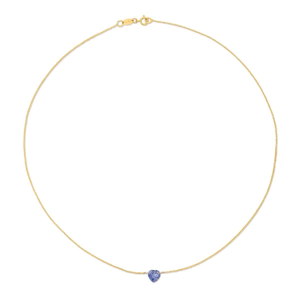 The Sweetheart Necklace - Blue Sapphire in yellow gold on a white background. 