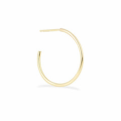 A Crescent Hoop / Medium in yellow gold on a white background.