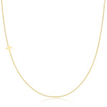 A yellow gold 14k Gold Asymmetrical Charm Necklace - Cross with a bead chain on a white background. 