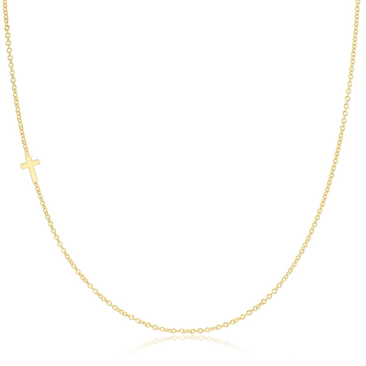 A yellow gold 14k Gold Asymmetrical Charm Necklace - Cross with a cable chain on a white background. 