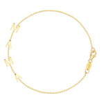 A Mama Bracelet in yellow gold with a beaded chain on a white background. 