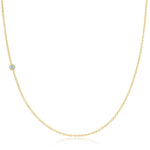 A yellow gold 14K Gold Asymmetrical Birthstone Necklace - Aquamarine (March) on a white background. 