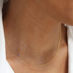 A white gold 14K Gold Asymmetrical Birthstone Necklace - Amethyst (February) on a white background. 